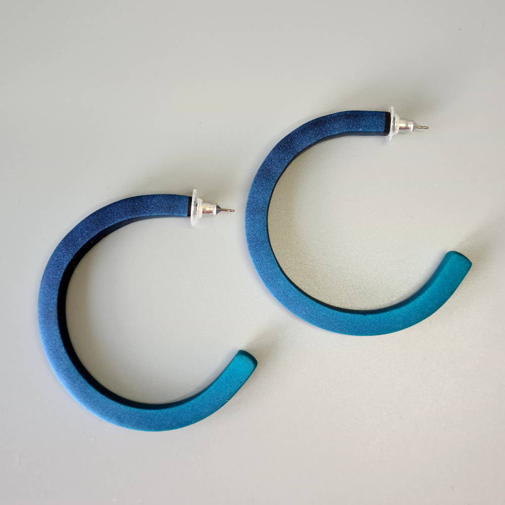 Handmade large hoop earrings in shimmering teal blue with ombre effect. Titanium posts.